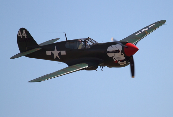 Curtiss P-40 Kittyhawk: Flypast by Kittyhawk following the unveiling on 18 August 2013 of the new Canadian war memorial on Worthing seafront