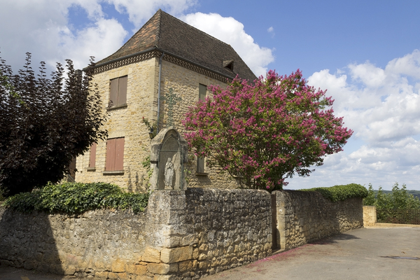 Old French house with idol