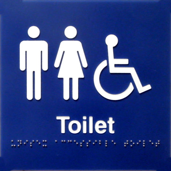 toilet location1: sign indicating public unisex toilets with wheelchair access in symbol, word and braille