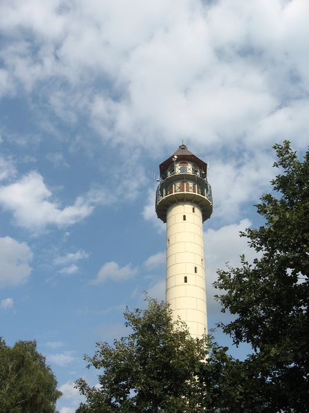 White tower: A 40-metre-high observation tower built at the summit of Dziewicza Góra (Virgin Mountain/Hill) in 2005. Used for forest fire observation, also open to tourists - offers wide views of the surrounding countryside and the city of Poznań, Poland.Feel free t