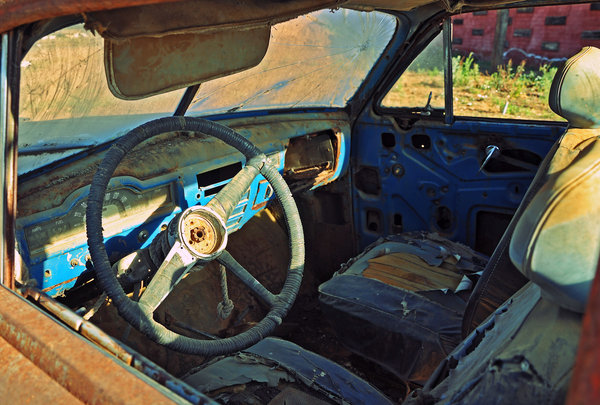 Rusty car interior: Image of an old, rusty, abandoned car 