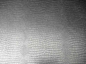 metallic leather texture: metallic leather texture, probably mock skin of a snake or a crocodile, but it won't bite anymore