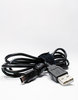 USB-firewire.: A cable I use to upload my photo from my Nikon D70 to my laptop computer.