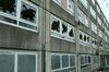 broken: broken windows from a block of flats that are getting knocked down,