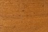 Laminate Wood Texture: A view of the grain pattern from the inside surface of a sliding door from a cheap cabinet. The wood has a mosaic like grain pattern from being peeled off of the log to make the thin laminate.