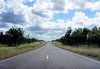 Open Road 2: Open road driving north in a remote area of Queensland. Seeing as I was actually driving at the time thereby risking life and limb to take these photos, I'd be grateful if you could rate them and leave a comment.(The things one does for a good photo...)