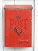 post box: a classic red post box.