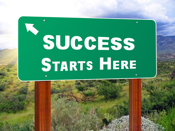 Success Starts Here Sign: Freeway styled sign. PSD available.
