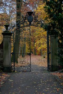autumn: ancient door in the park of the castle of Karlsruhe/Germany