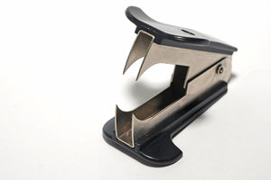 Staple remover 2: Device that allows for the quick removal of a staple from a material without causing damage