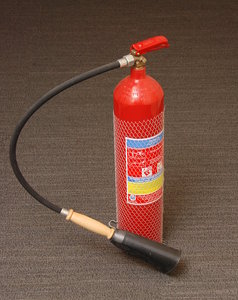 A stored-pressure fire extingu: A fire extinguisher is an active fire protection device used to extinguish or control small fires, often in emergency situations