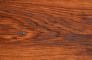 Sun worn wood: Close up of a warm wood grain texture.