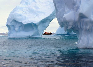 Iceberg cathedral: Looming over the zodiac, the icebergs seem to go on forever.  This was a chance shot when the zodiac happened to cross a small open area.