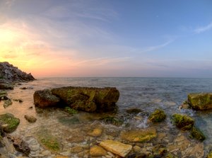 Coast, cliff and sea - HDR: rocky coastline in sunraise. The picture is HDR