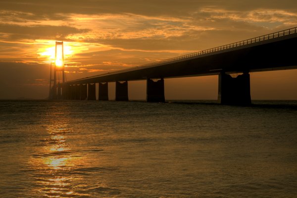 Bridge in sunset - HDR: The Great Belt Bridge in Denmark in october sunset. The picture is HDR.