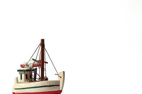 Fishing boat - model: A small model of a fishing boat with white background