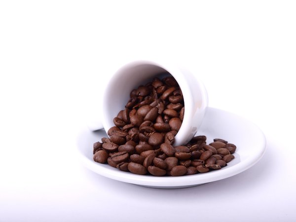 Coffeebeans no copo de café expresso: 