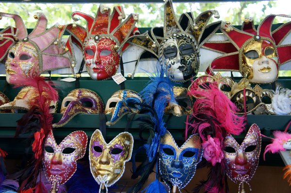 carnival mask display: assorted colorful Venice styled festive masks
