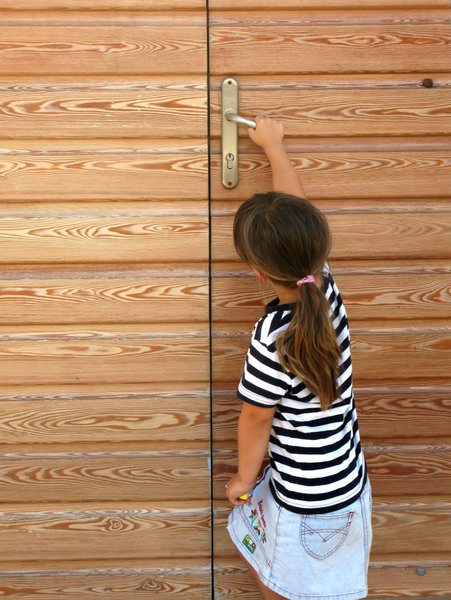 small girl,big door: 
