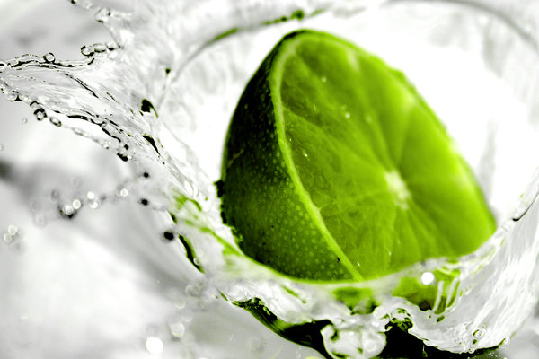 Lime Light: Lime splashing into water. Extremely shallow DoF