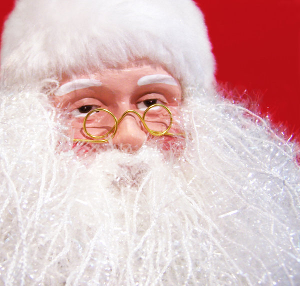 Checking the list: Santa needs his glasses to check the list... now who has been naughty?...and who has been nice?...