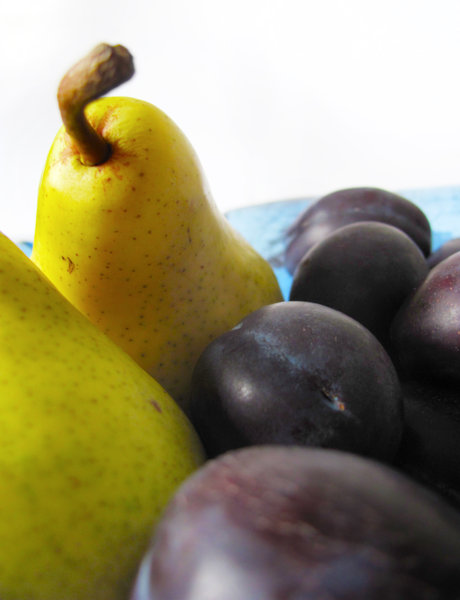 pears and plums 3: yellow and blue fruit close-up