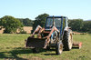 Tractor: A tractor parked after a day's work in fields in West Sussex, England.