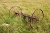 Old harrow: An old neglected harrow in a field in Denmark.