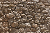 Stone wall background: A rough old stone wall in Ibiza, Spain.