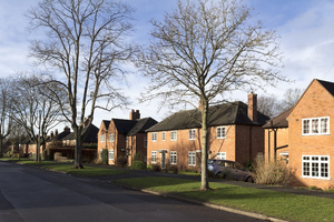 Suburban houses: Pink brick houses in a suburb of Birmingham, England.