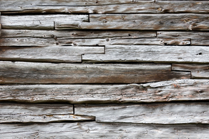 Wooden wall texture: Part of a wall of an old wooden cabin in Norway