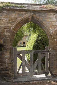 Gate and arch: An old gate and arch in Somerset, England.