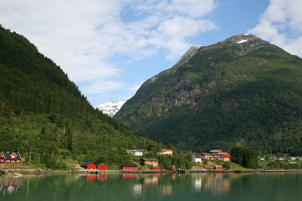 Fjord village: A village beside a fjord in Norway.