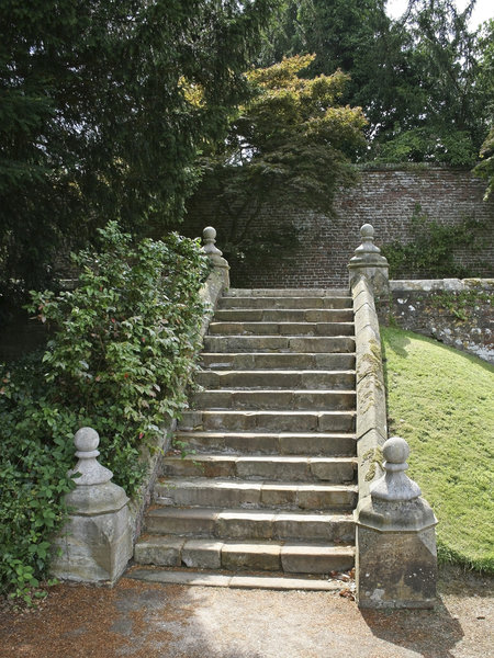 Stone steps: A stone staircase in a garden in East Sussex, England.