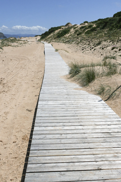 Beach boardwalk: A boardwalk over a soft sand beach in southern Spain.