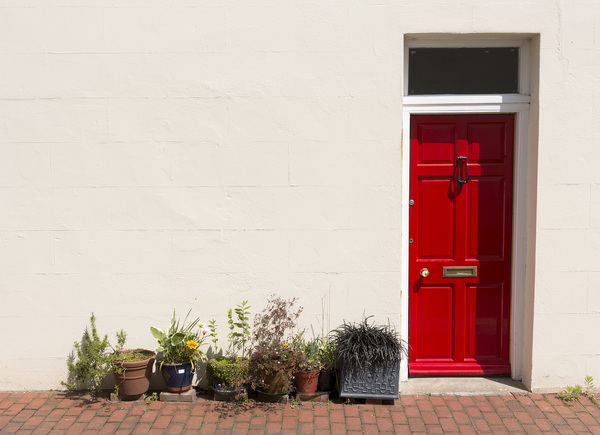 Red door: Side door to an alley in Sussex, England.