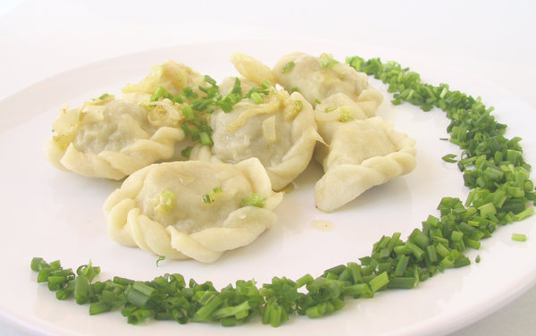 pierogi: polish dumplings.here - version with meat, although you may not see that :Dvery tasty
