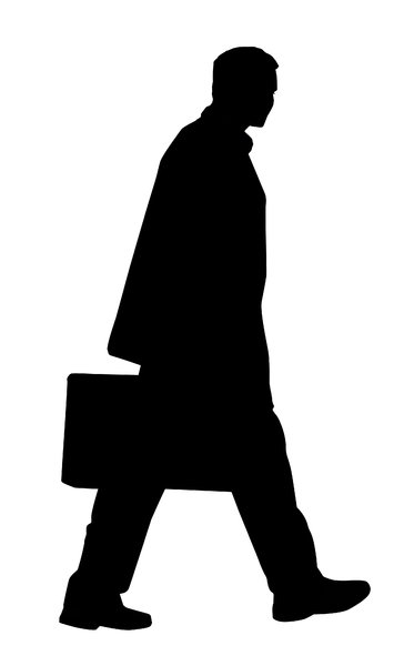 Man with suitcase: A businessman with a suitcase.