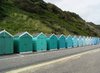 Beach huts: Multi-coloured beach huts along Bournemouth beach.