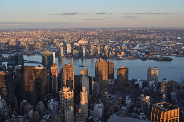 View from the Empire State: Evening light over the Manhattan skyline.