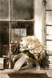 Bouquet and book: Bouquet in the window of an old Southern building