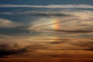 Rare Rainbow: It happens from a clouds layer to other clouds layer. Not in contact with earth!