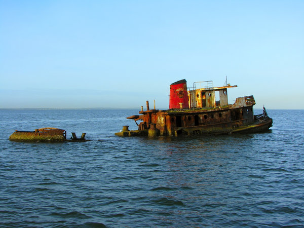 Tug No More: Done with it's useful life, now used as fishing platform