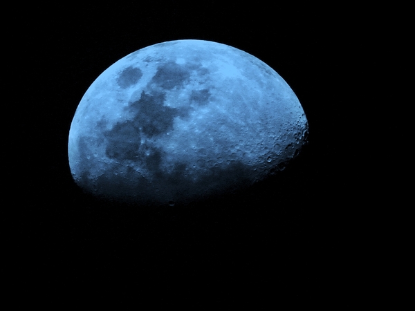 spotted moon: blue half moon with crater spots