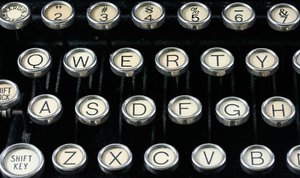 Antique Typewriter Close-up: Close-up of an antique qwerty-format typewriter.