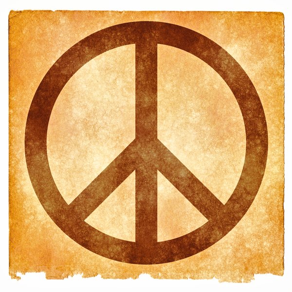 Peace Grunge Sign: Grunge textured peace symbol on vintage paper, with sepia toning for a more aged feel.