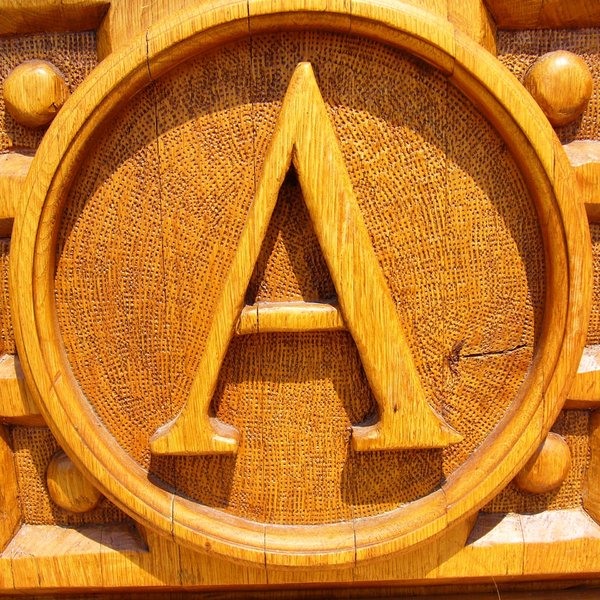 Letter A: A Letter A, carved into the door of the church at Sirok in Hungary