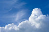 Spring clouds: White clouds on spring blue sky background