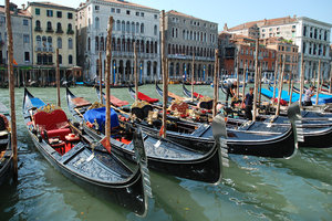 Gondola Parking: Line-up of Gondalas, Venice, Italy.