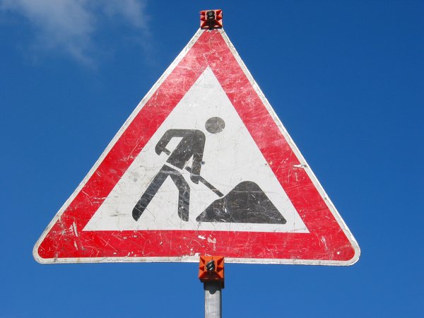 Traffic Sign: Traffic sign, warning, road work ahead. Germany.